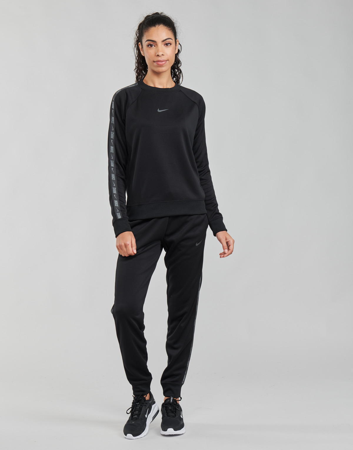 Oblečenie Žena Tepláky a vrchné oblečenie Nike W NSW PK TAPE REG PANT Čierna